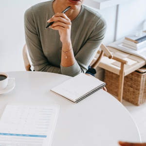 confident working mother on a coffee table transitioned to work from breastfeeding